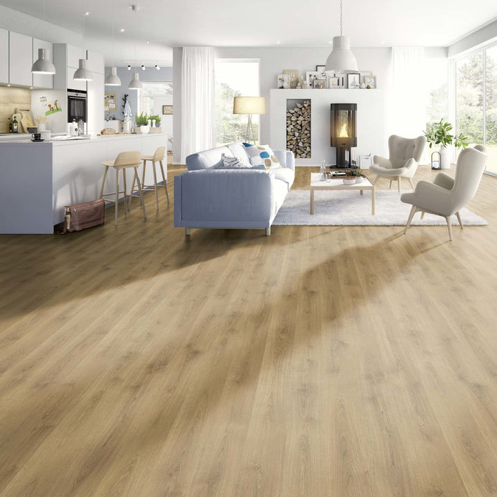 Watermill Oak Plank 12mm AC4 Laminate Flooring installed in a room