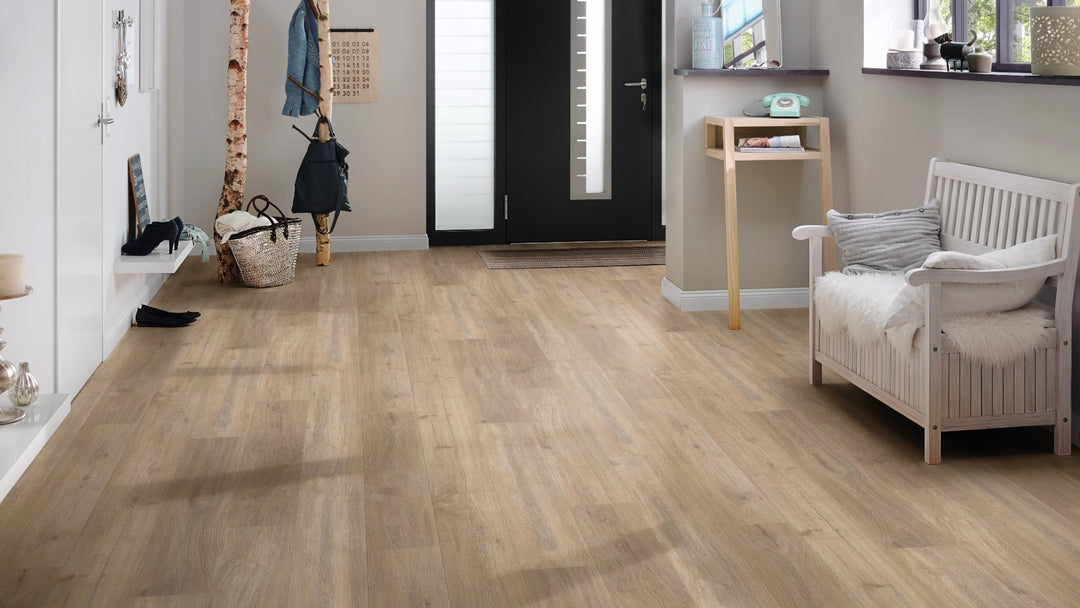 Bermuda Oak 12mm AC5 Aqua Laminate Flooring installed in a room