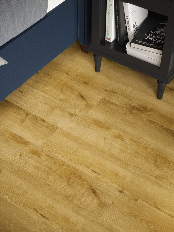 Stade Oak Plank Aqua 72 12mm AC5 Laminate Flooring installed in a bedroom