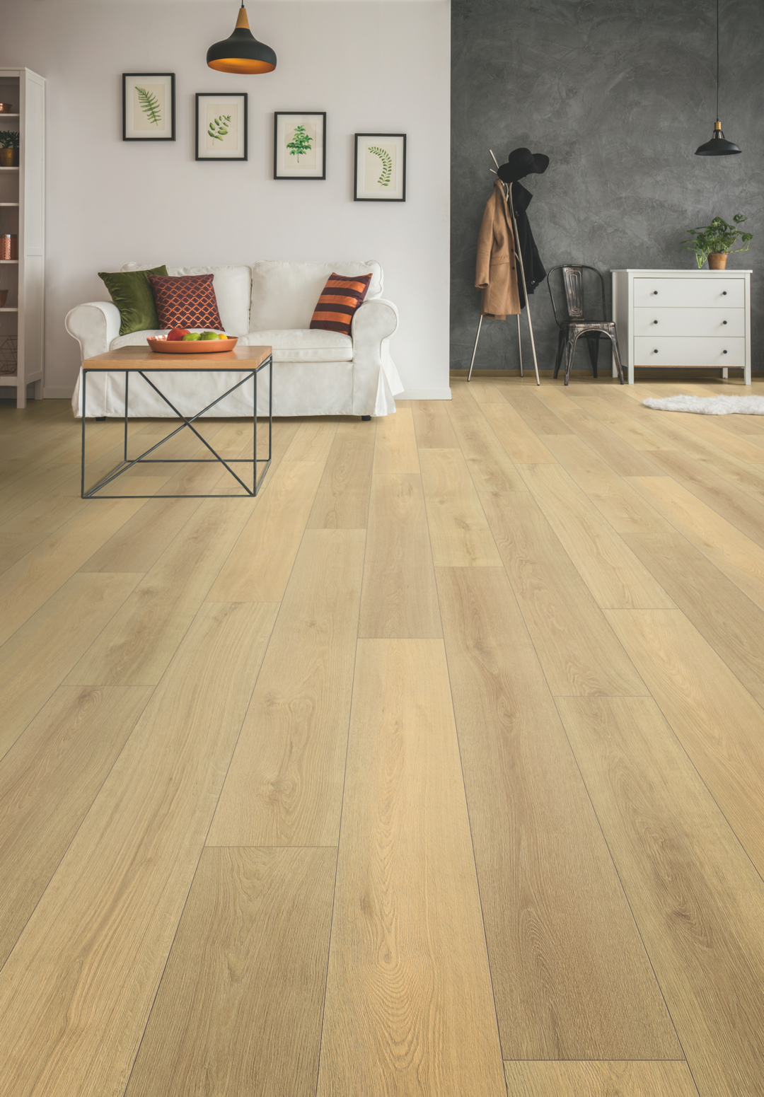 Blonde Montreux Oak Long Plank Aqua Plus 12mm AC5 Laminate Flooring installed in a room
