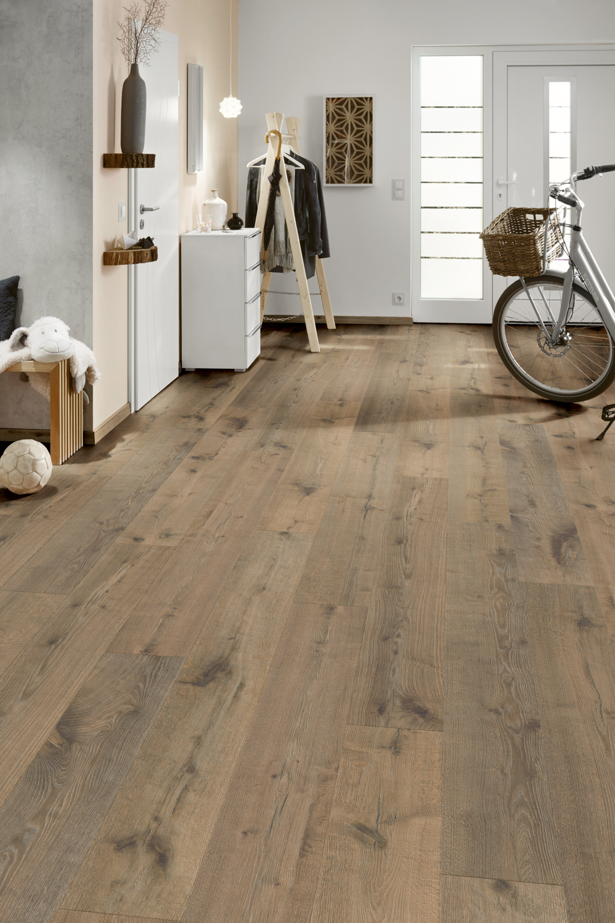 Hare Tegernsee Oak Long Plank Aqua Plus 12mm AC5 Laminate Flooring installed in a room