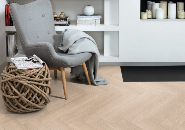 Light Baronia Oak 8mm herringbone laminate flooring room view
