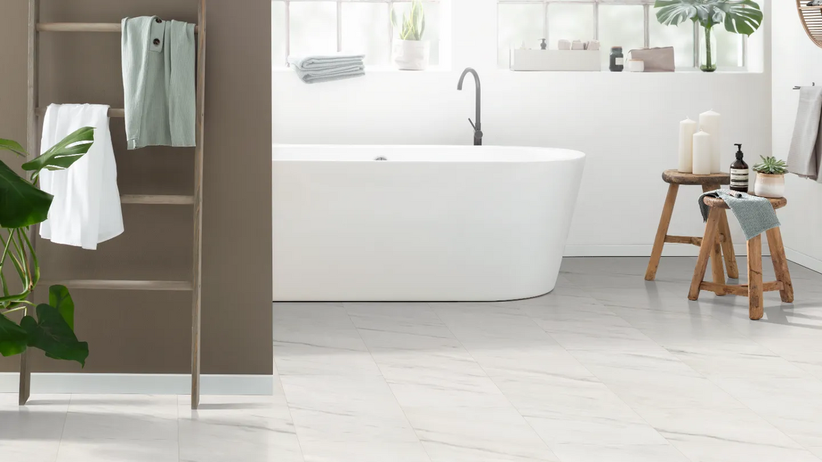 White Levanto Marble Aqua tile effect laminate flooring in a bathroom